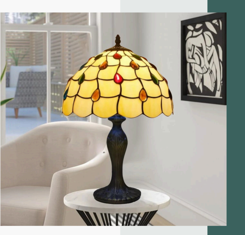 Tiffany style 10-Inch Antique table lamp on a white surface with a blurred background