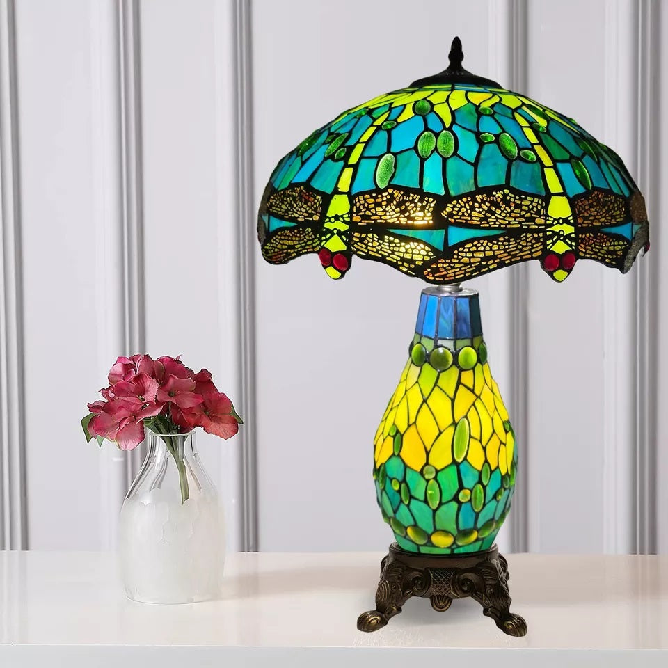 A beautiful green stained dragonfly tiffany cluster table lamp