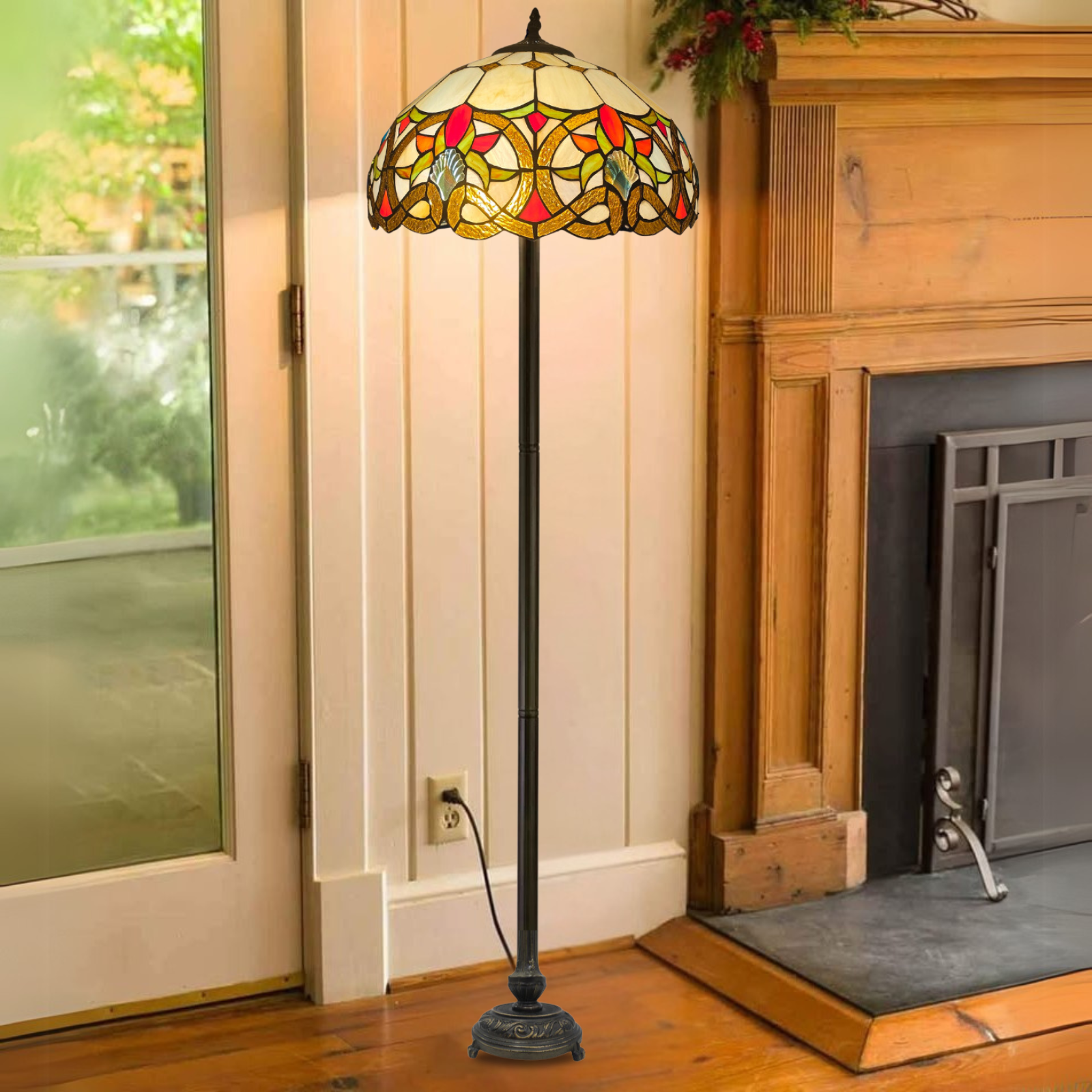 A vintage multicolor stained glass tiffany 16 inch large floor lamp placed in a living room