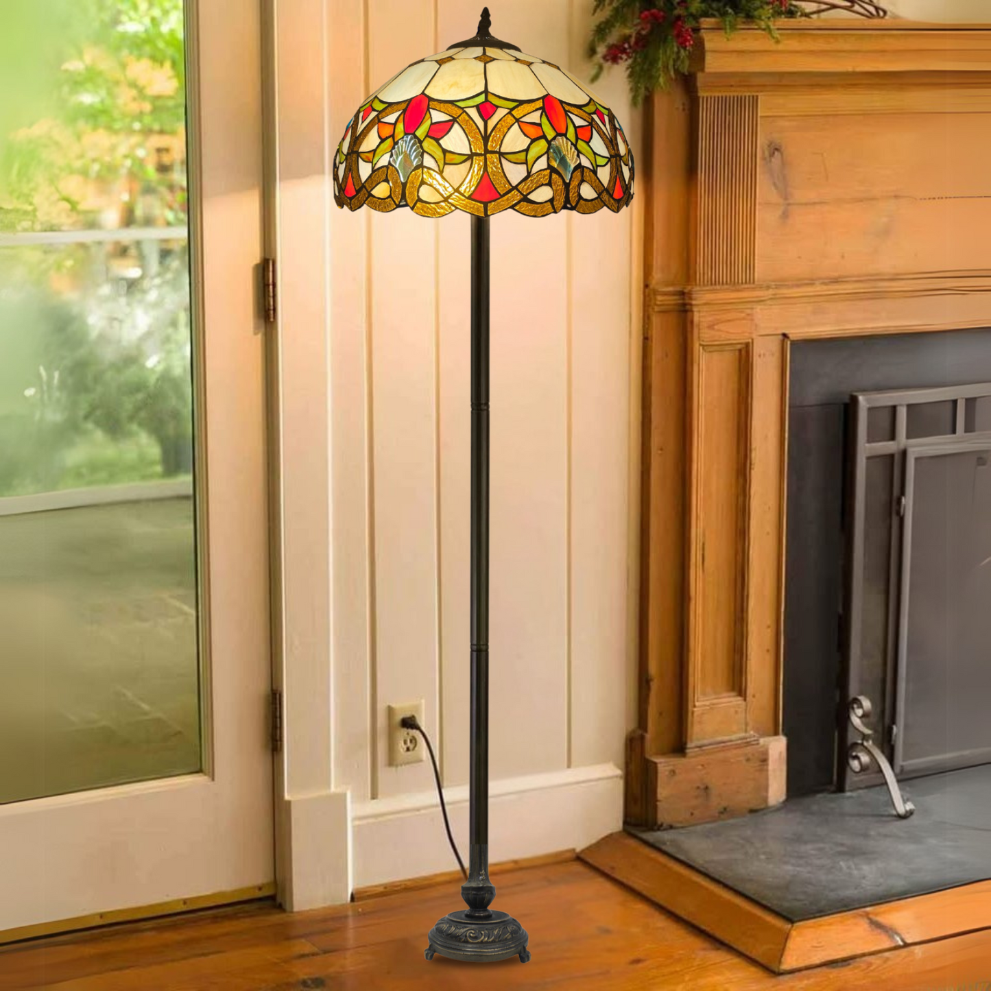 A vintage multicolor stained glass tiffany 16 inch large floor lamp placed in a living room