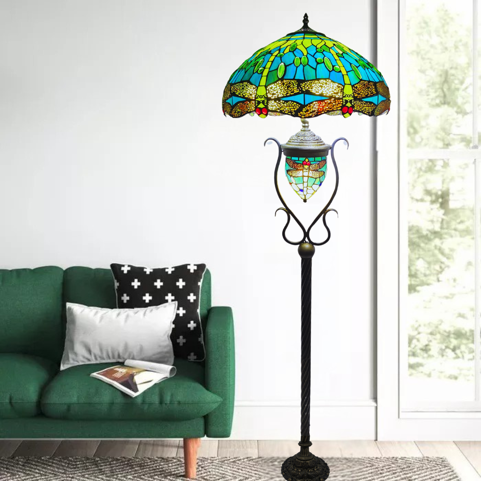 A green dragonfly tiffany style 18-inch floor lamp placed near a sofa in a living room