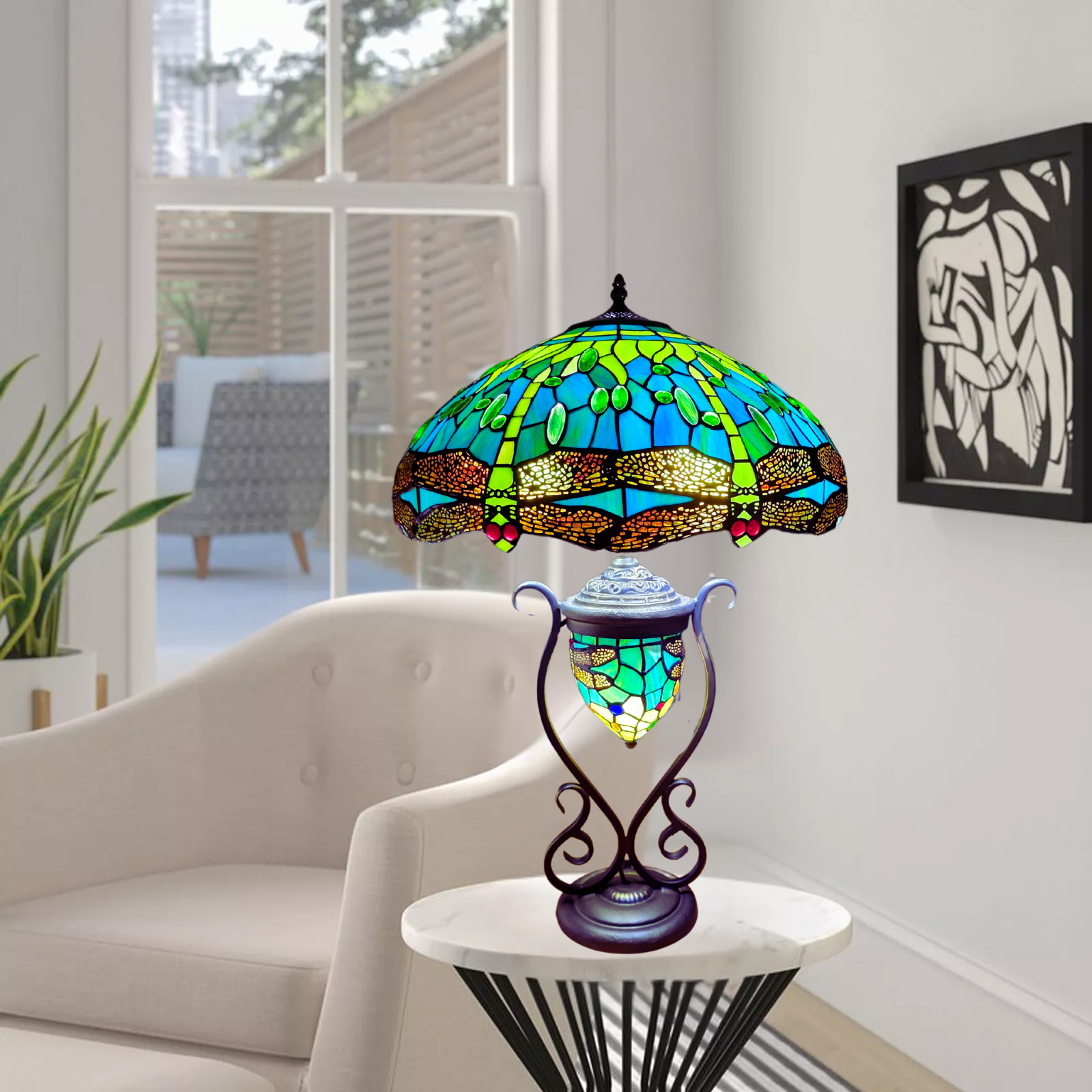 An antique green color stained glass tiffany style handmade 18 inch cluster table lamp placed on a table in a living room