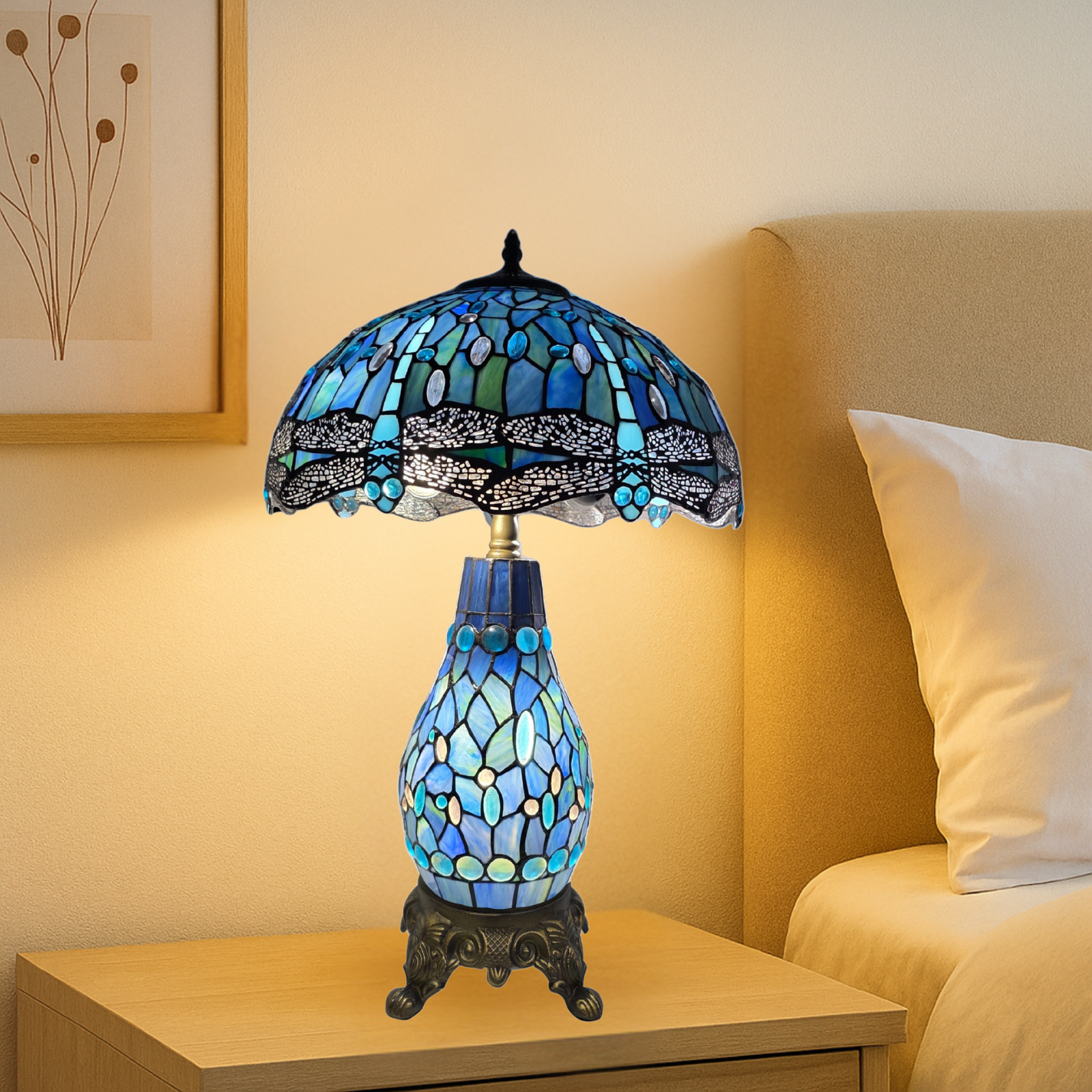 16-Inch blue and black tiffany style cluster table lamp with stained glass design on a nightstand next to a bed.